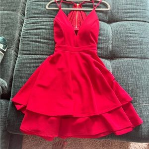 Red dinner cocktail dress. Honey and Rosie red cutout lacy back.